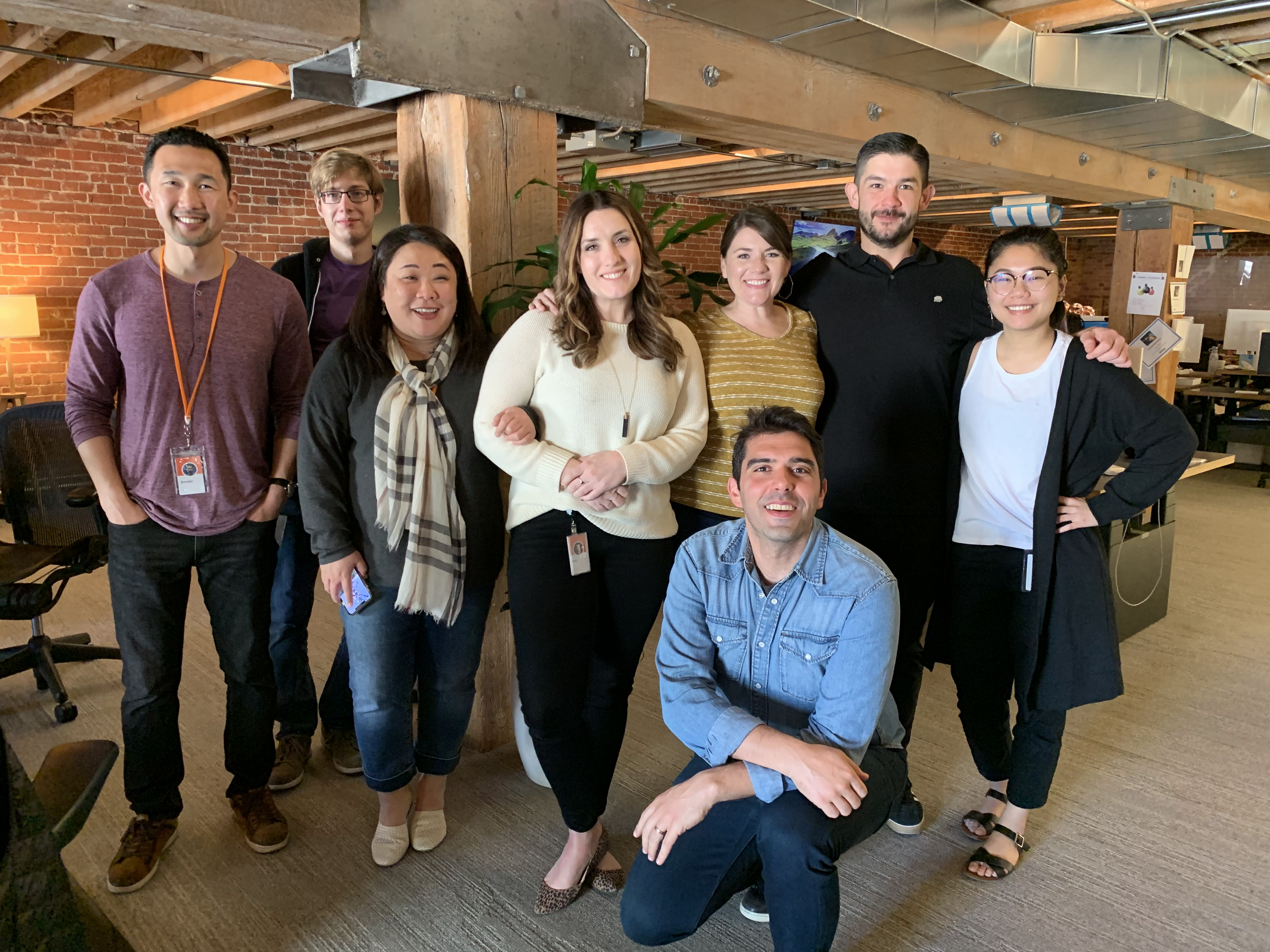 Hubbers (left to right) Brandon Ngo, Jared Valdron, Julie Hata, Amy Cano, Emily Bergen, Andi Aliko (kneeling), Victor Valdez, Sally Tran